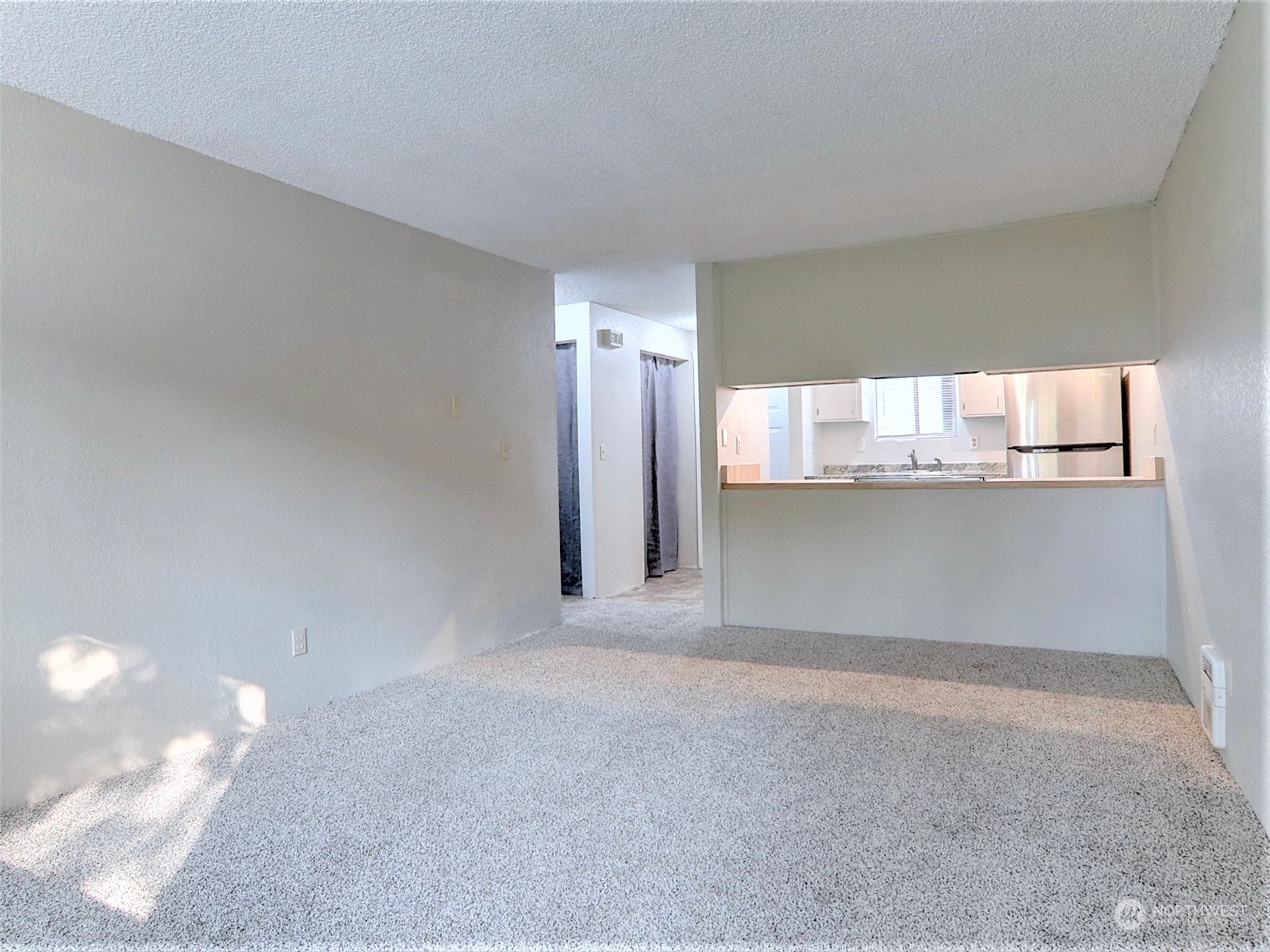 2629 Rucker Avenue, Unit 6 Everett, WA 98201 - Photo 8 of 14 a view of an empty room with a window