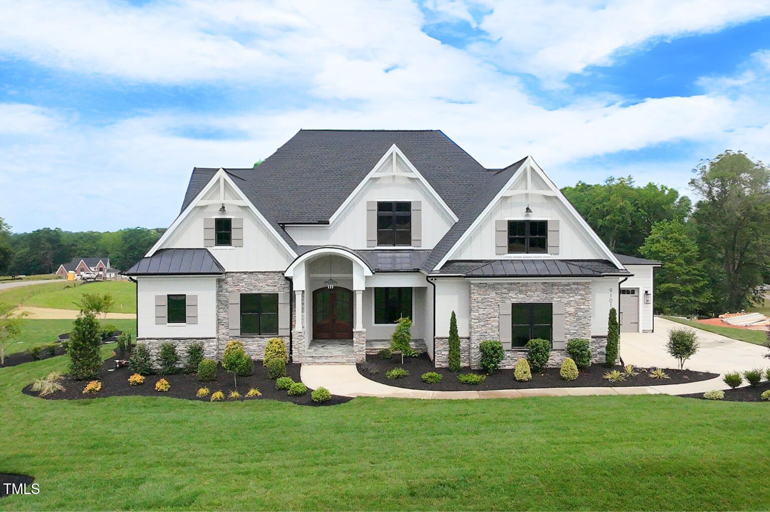 9101 Overlook Crest Drive Wake Forest, NC 27587 - Photo 1 of 5 a front view of a house with a yard