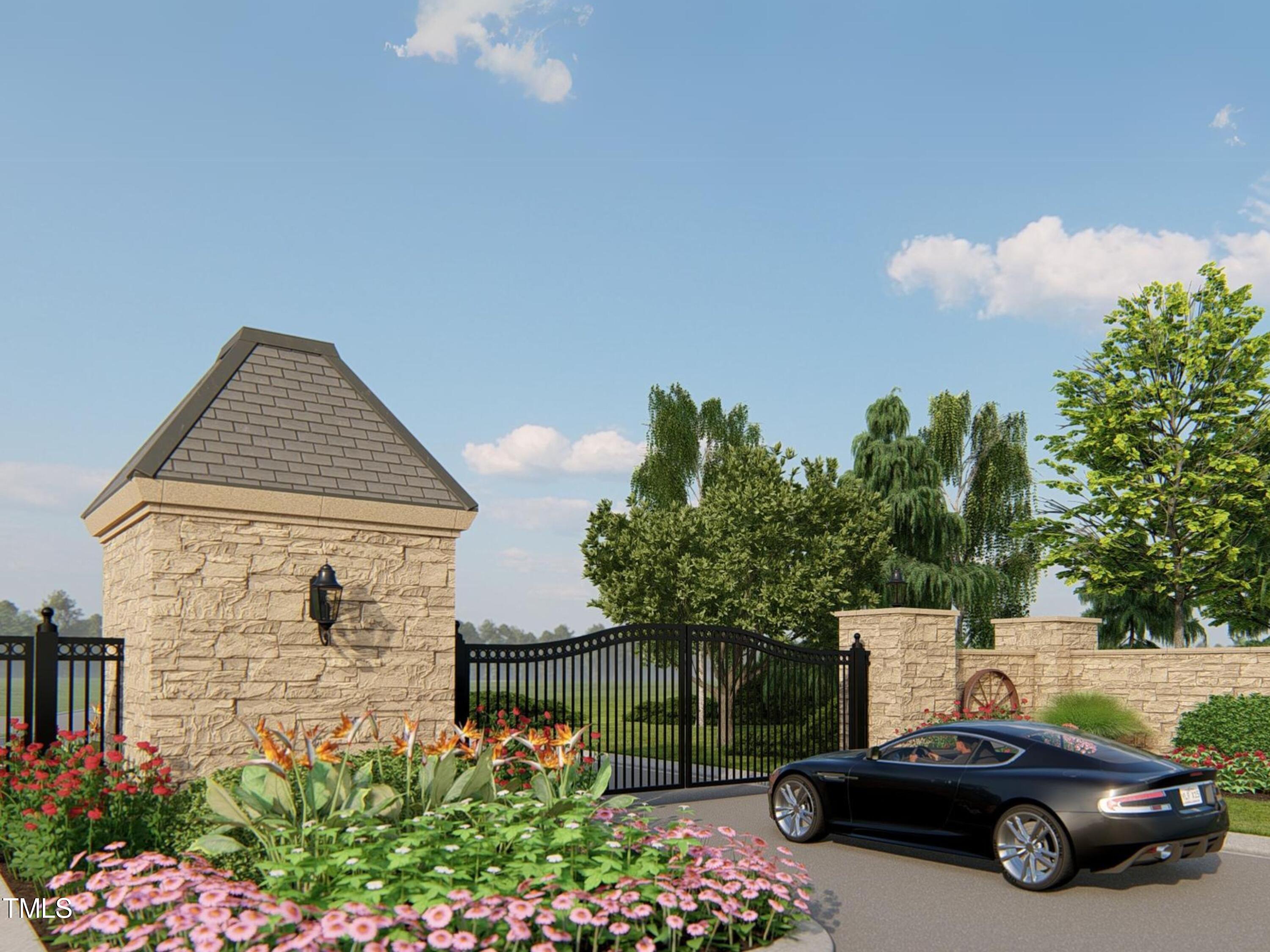 9101 Overlook Crest Drive Wake Forest, NC 27587 - Photo 5 of 5 a car parked in front of a house with potted plants