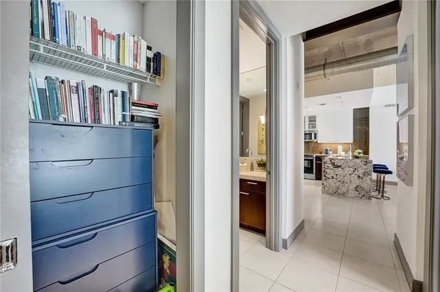 a bedroom with a bed and a cabinets