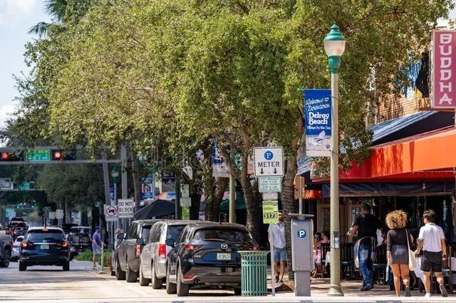 a view of multiple houses with a yard