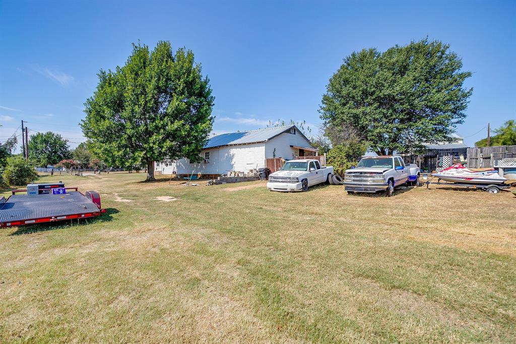 1035 Summit Drive Springtown, TX 76082 - Photo 35 of 38 View of grassy yard with a wooden deck