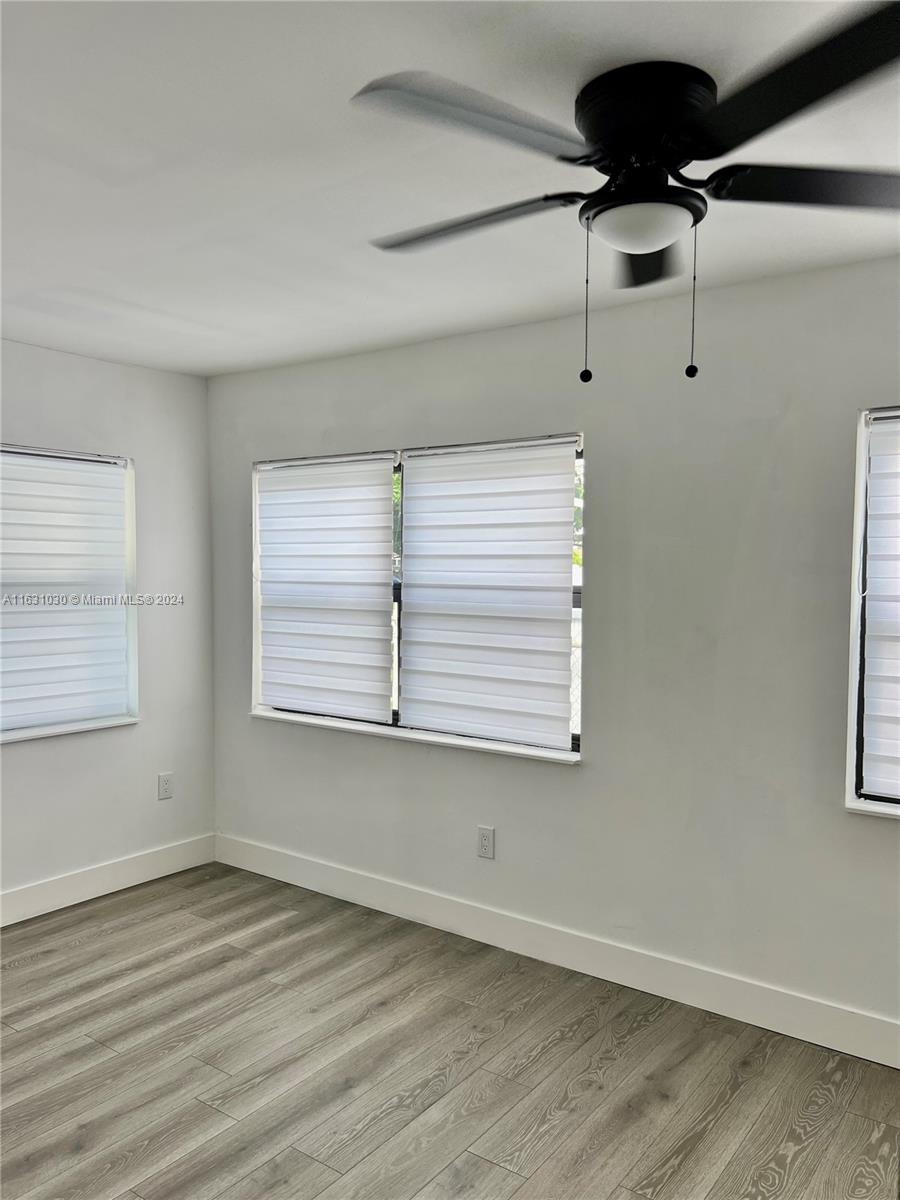 945 Curtiss Drive Opa-Locka, FL 33054 - Photo 12 of 18 an empty room with a window