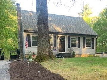 212 Arnold Road Sturbridge, MA 01518 - Photo 20 of 21 a front view of a house with garden
