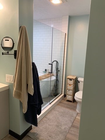 212 Arnold Road Sturbridge, MA 01518 - Photo 6 of 21 a bathroom with a sink and toilet