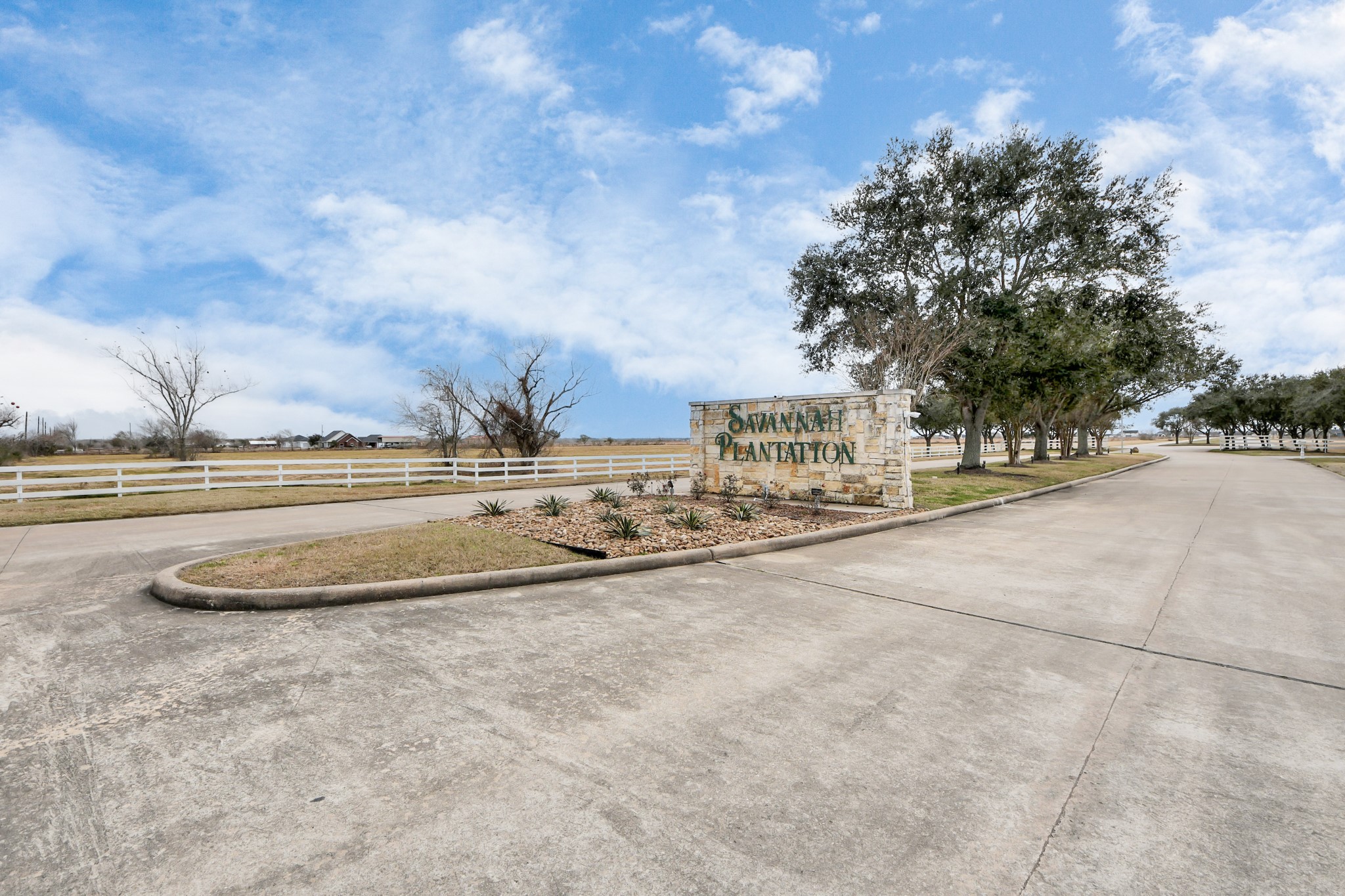 7419 Augusta Lane Rosharon, TX 77583 - Photo 2 of 35 a view of a building with trees in the background