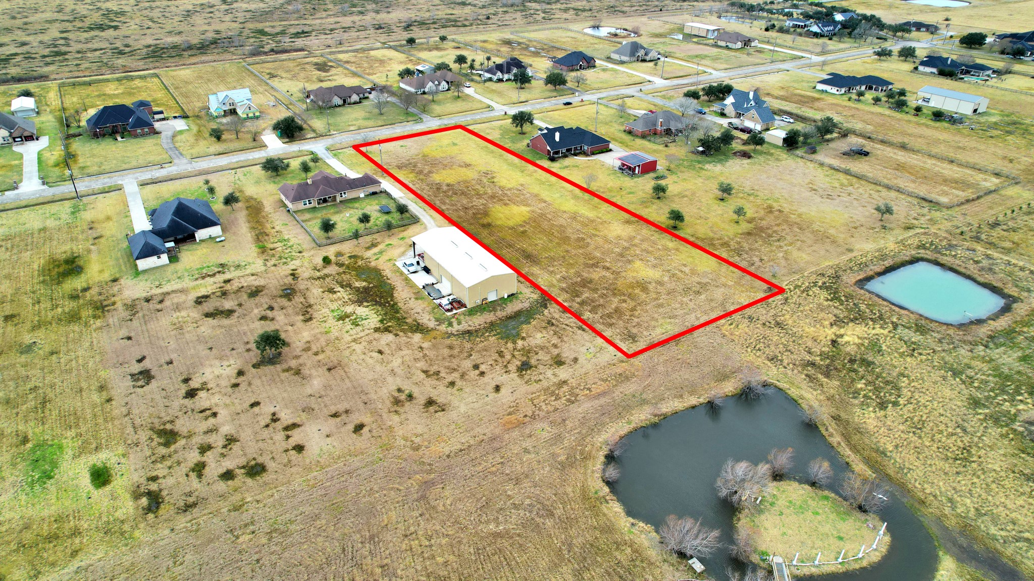 7419 Augusta Lane Rosharon, TX 77583 - Photo 22 of 35 a picture of water heater and wooden floor