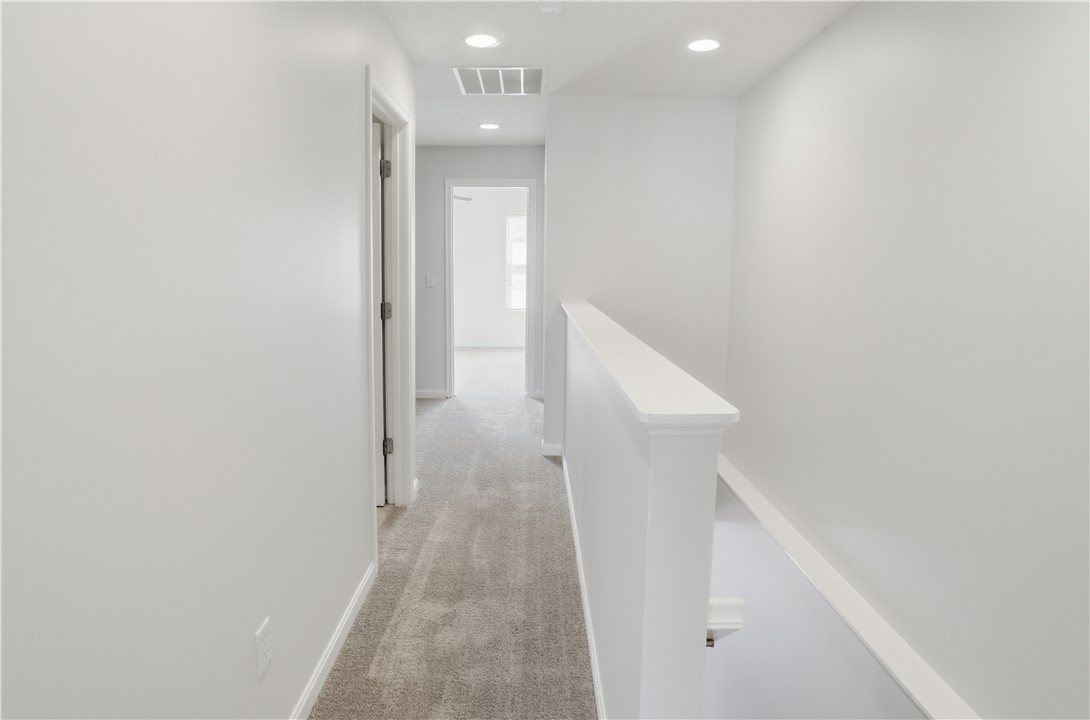 4294 Straight Arrow Road Dayton, OH 45430 - Photo 19 of 41 This bright hallway offers seamless transitions and modern recessed lighting.