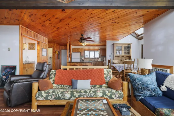 a view of a living room with furniture