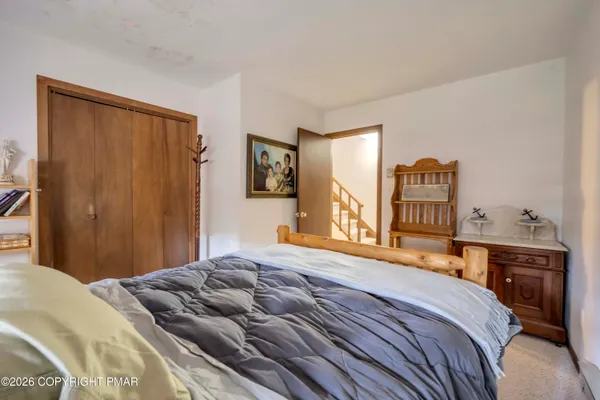 a picture of a bench in front of a door