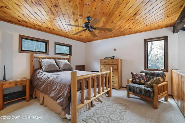 a view of a balcony with trees