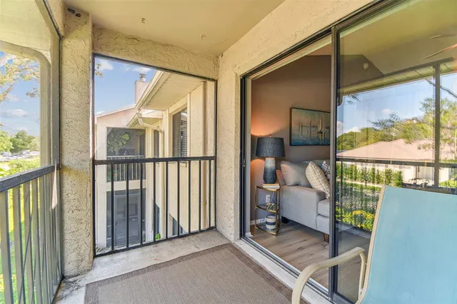 a balcony with furniture