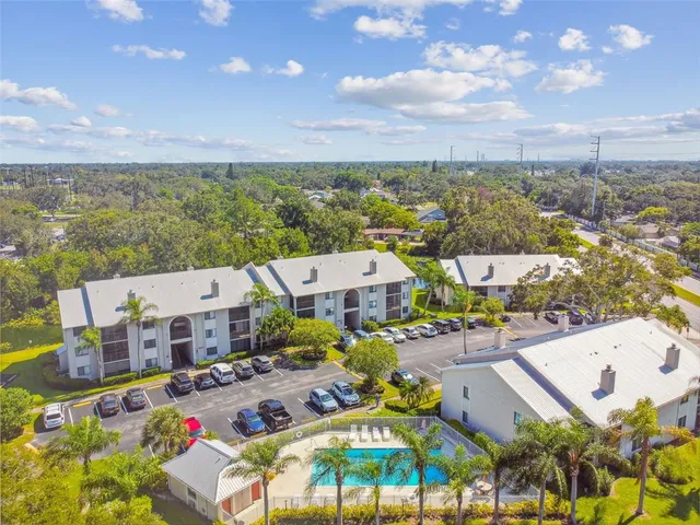 an aerial view of a house with a ocean view