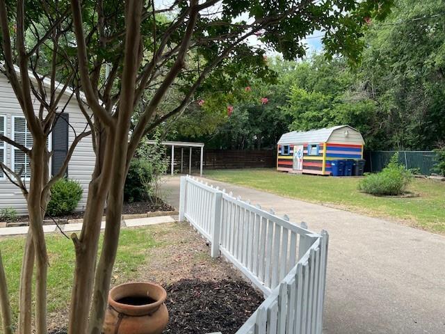 117 Ida Street McKinney, TX 75069 - Photo 17 of 20 a view of house with backyard and trees