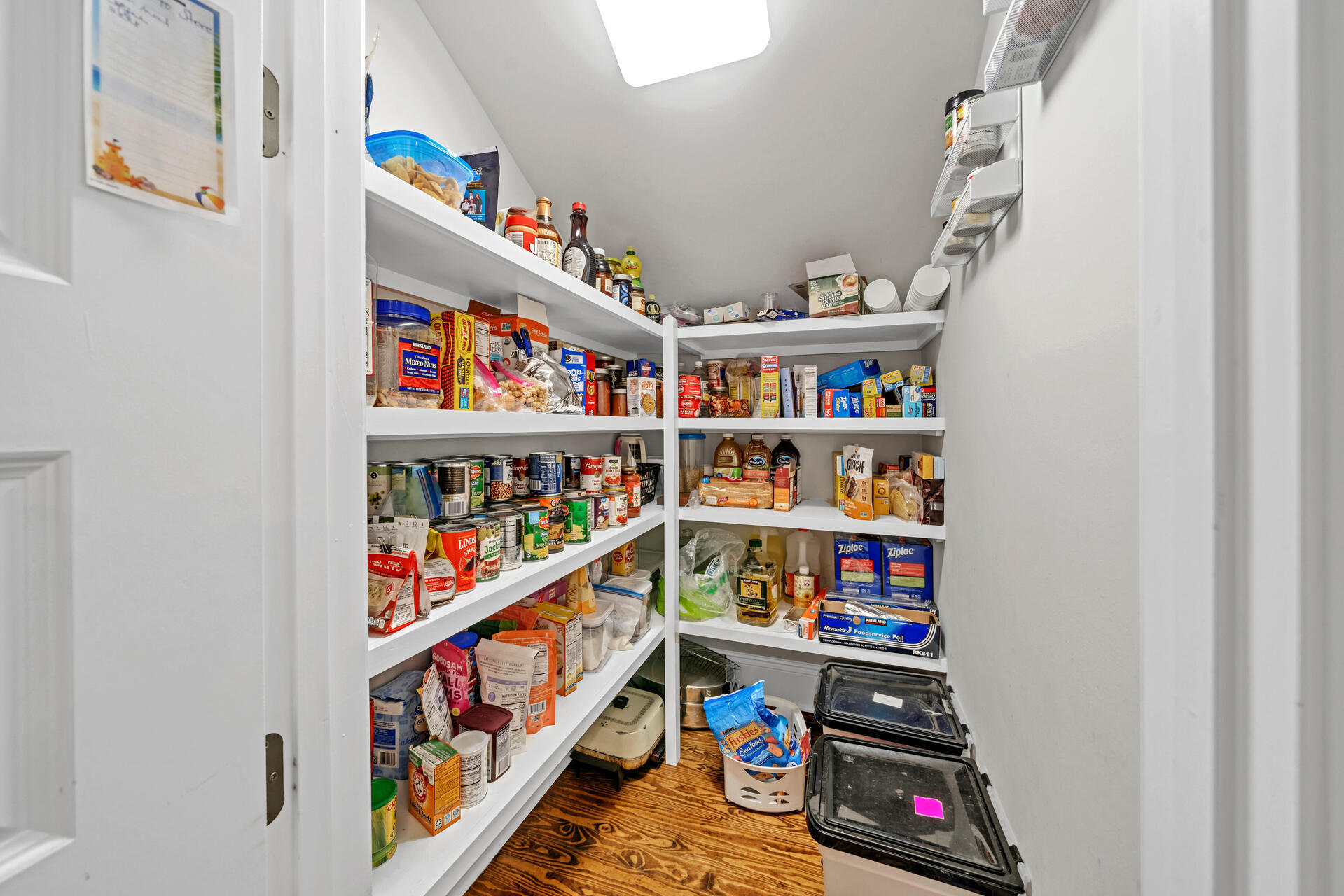 90 Delbert Lane Santa Rosa Beach, FL 32459 - Photo 12 of 47 a room with lots of books and a book shelf