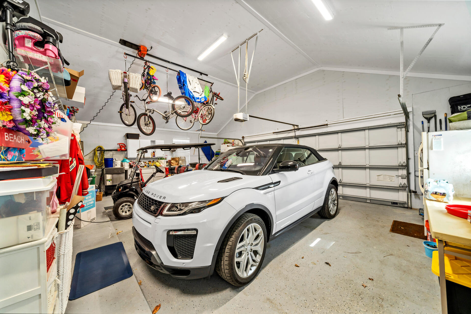 90 Delbert Lane Santa Rosa Beach, FL 32459 - Photo 14 of 47 a utility room with a bike and car