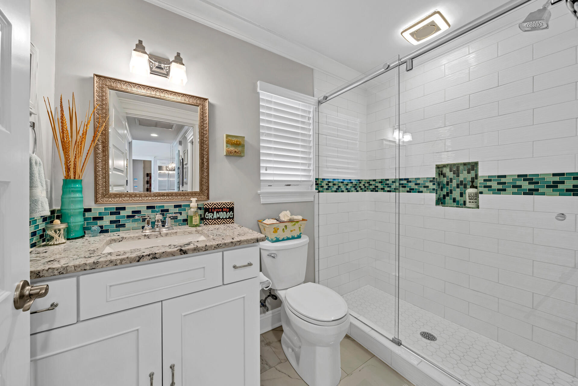 90 Delbert Lane Santa Rosa Beach, FL 32459 - Photo 21 of 47 a bathroom with a granite countertop sink a toilet and shower