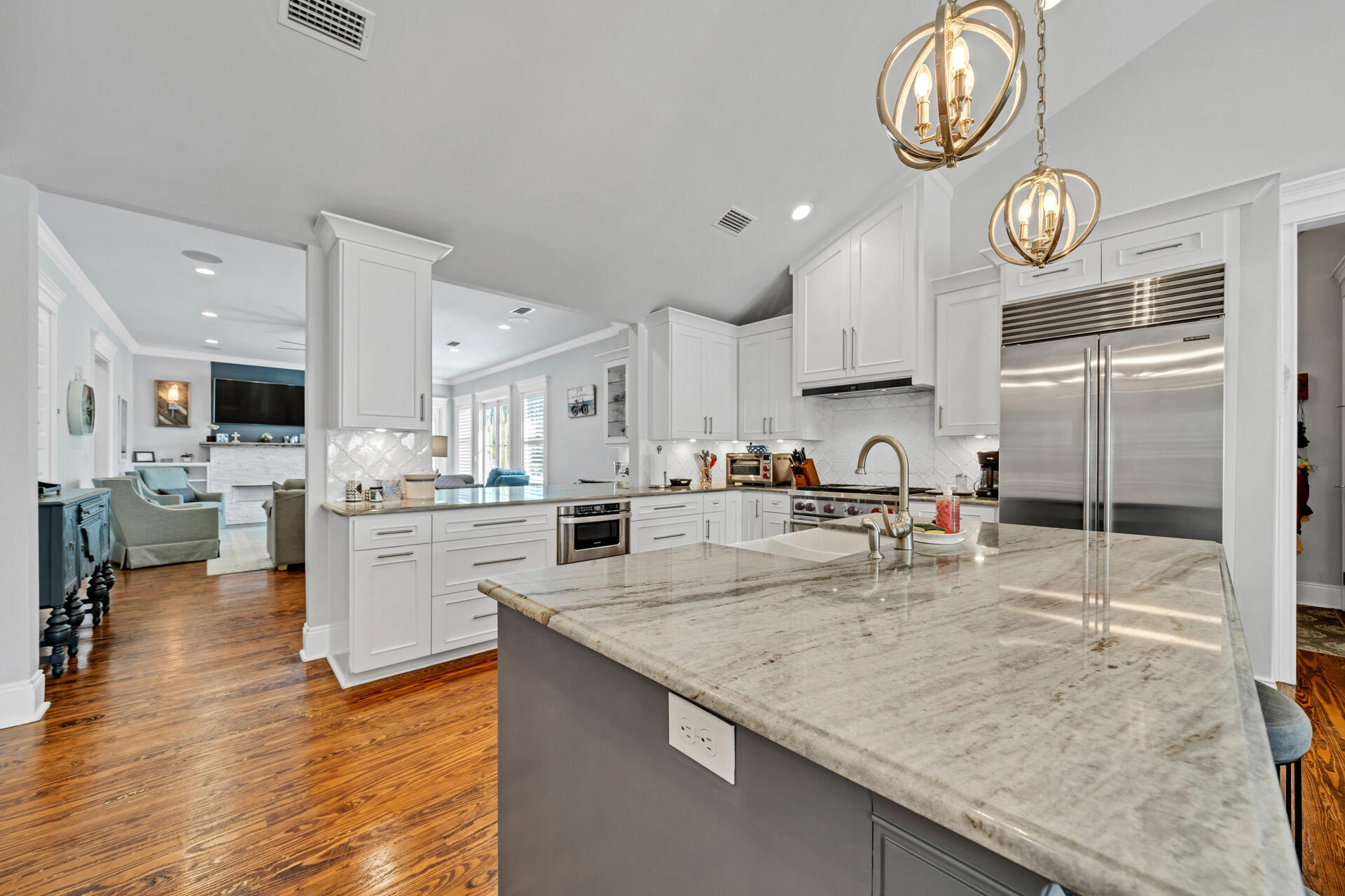 90 Delbert Lane Santa Rosa Beach, FL 32459 - Photo 3 of 47 a large kitchen with a large counter top appliances and cabinets
