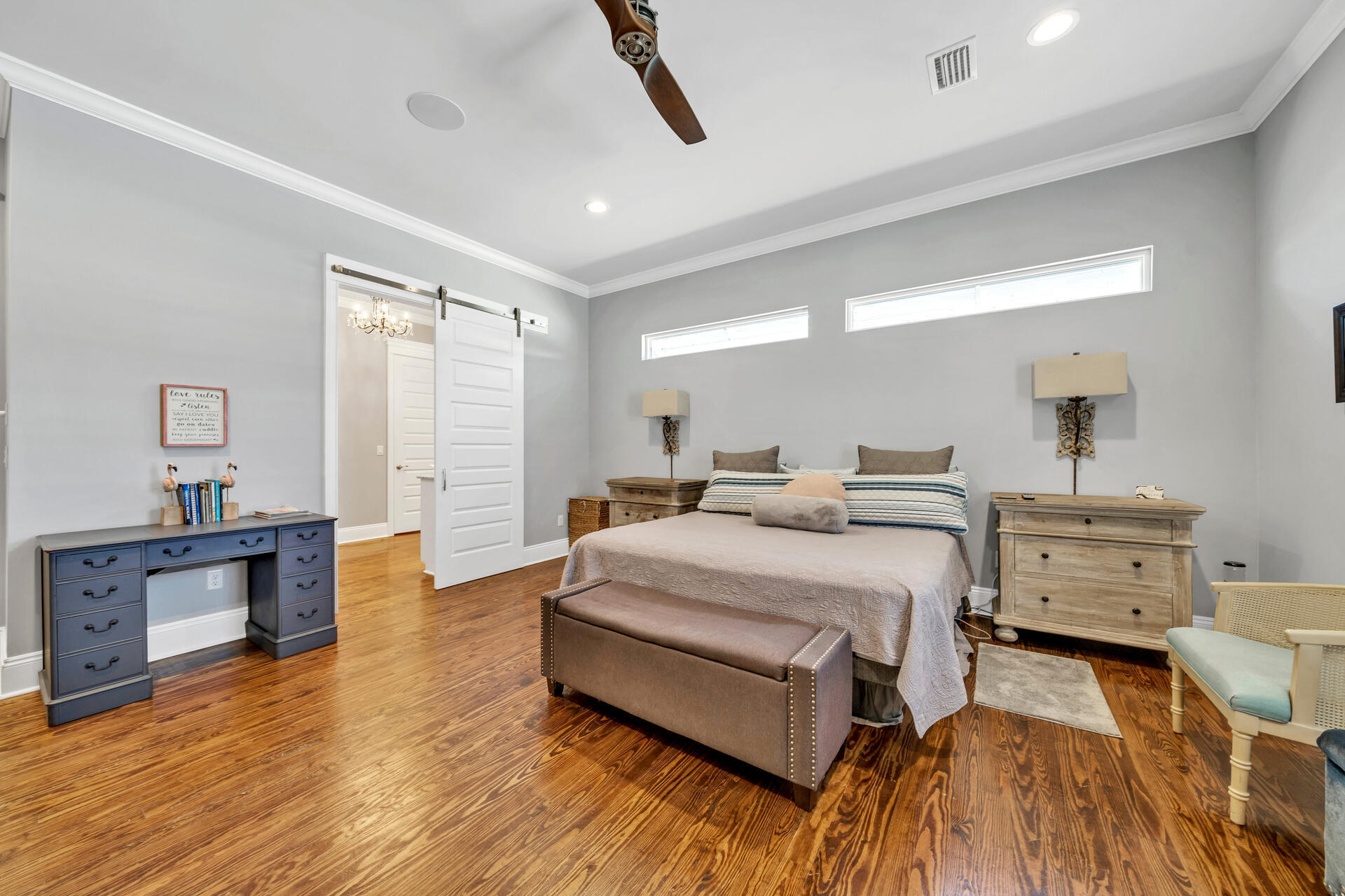 90 Delbert Lane Santa Rosa Beach, FL 32459 - Photo 31 of 47 a spacious bedroom with a bed and a dresser