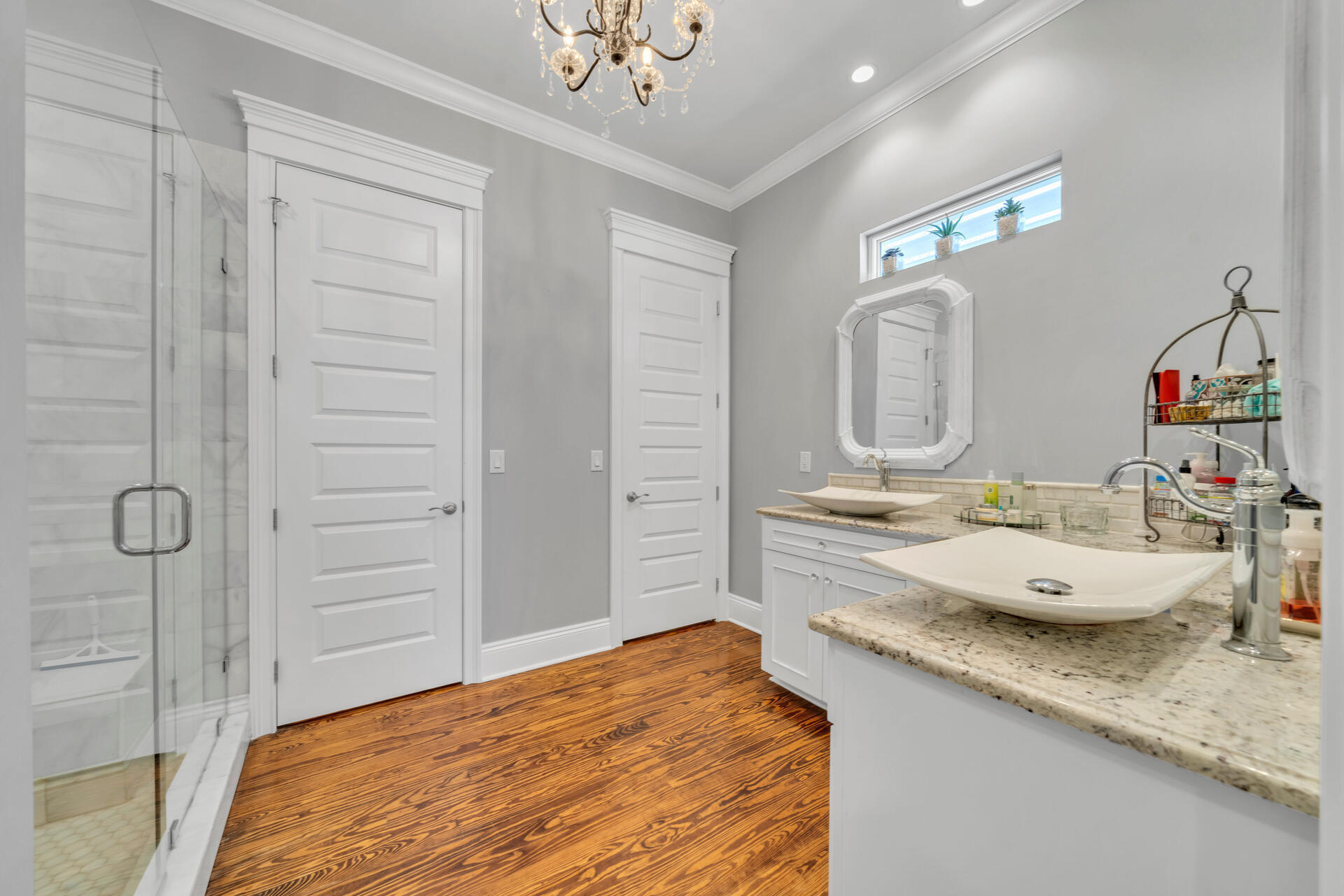 90 Delbert Lane Santa Rosa Beach, FL 32459 - Photo 32 of 47 a bathroom with a granite countertop sink a mirror and shower