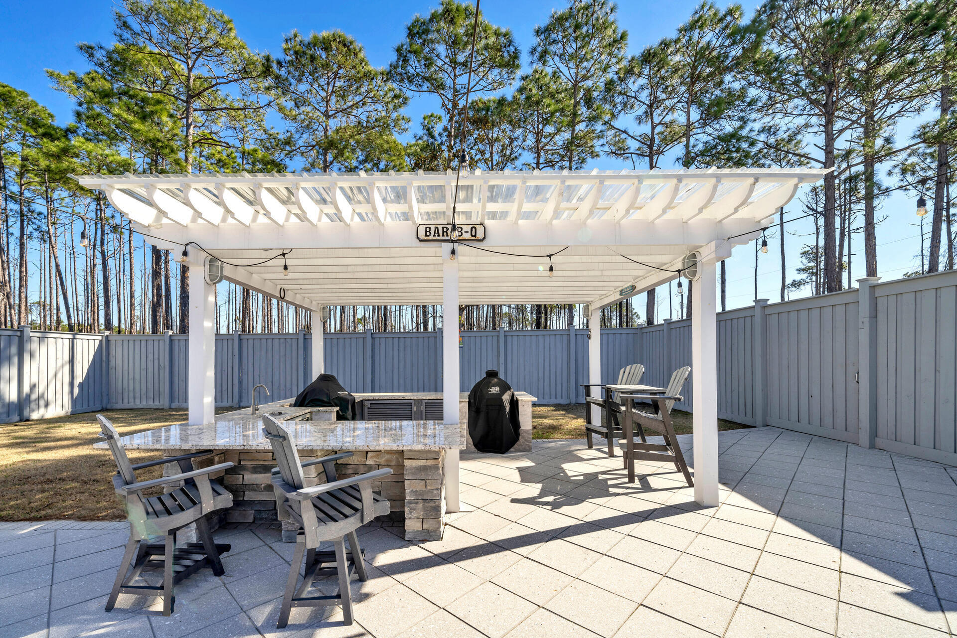 90 Delbert Lane Santa Rosa Beach, FL 32459 - Photo 42 of 47 a view of a chairs and table in a patio