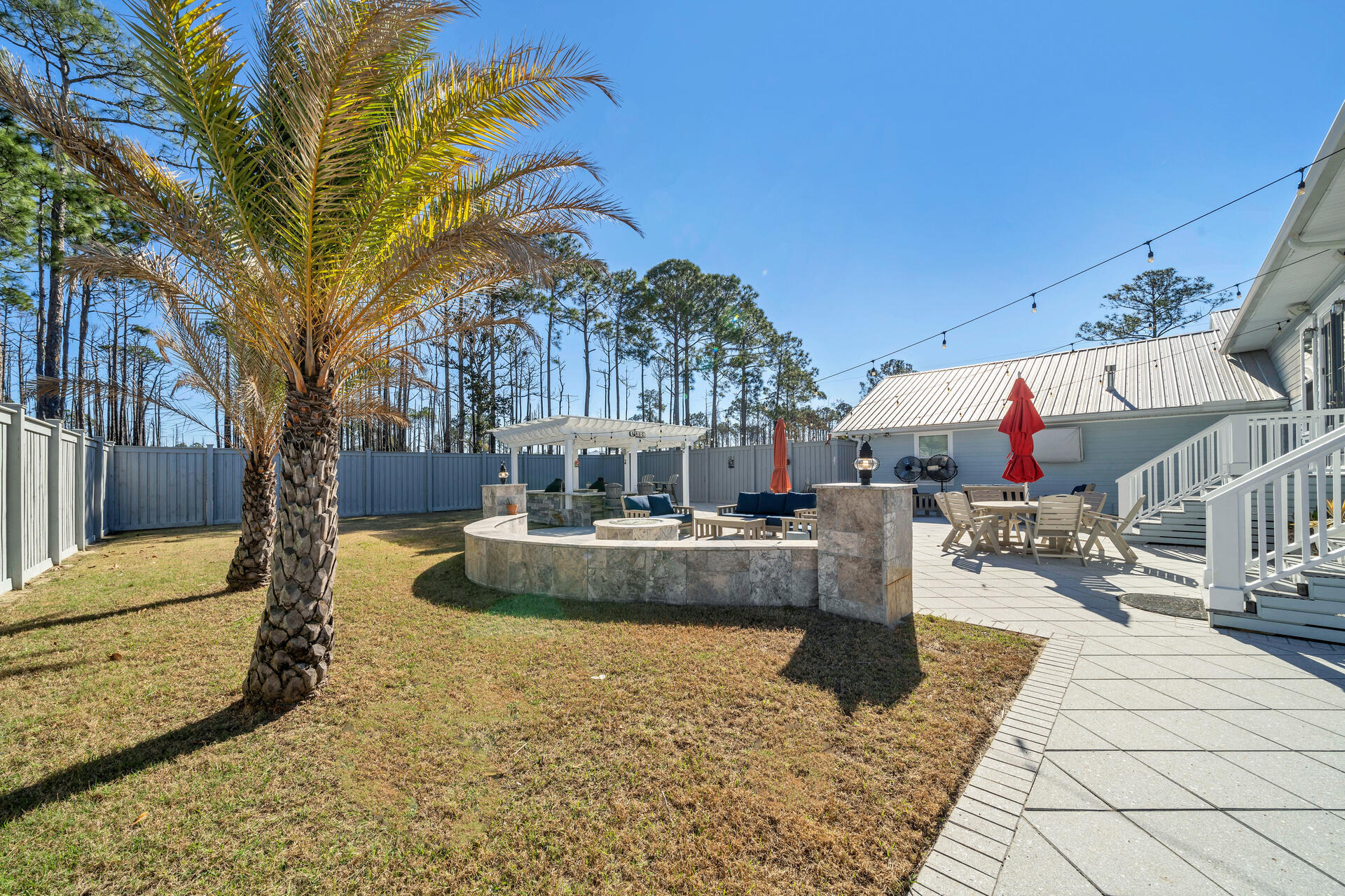 90 Delbert Lane Santa Rosa Beach, FL 32459 - Photo 45 of 47 a view of a swimming pool with a patio