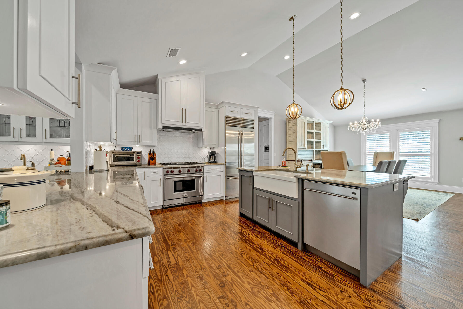 90 Delbert Lane Santa Rosa Beach, FL 32459 - Photo 7 of 47 a kitchen with stainless steel appliances granite countertop a sink a stove and a wooden floors