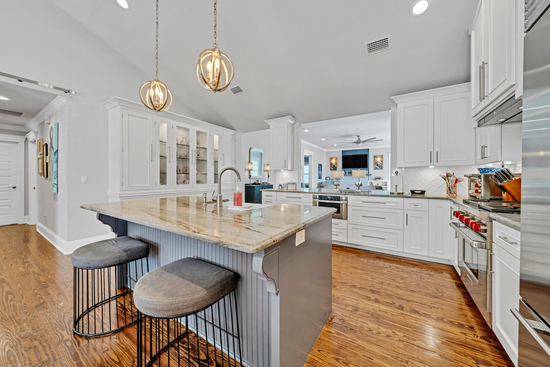 90 Delbert Lane Santa Rosa Beach, FL 32459 - Photo 8 of 47 a kitchen that has a lot of cabinets and wooden floor