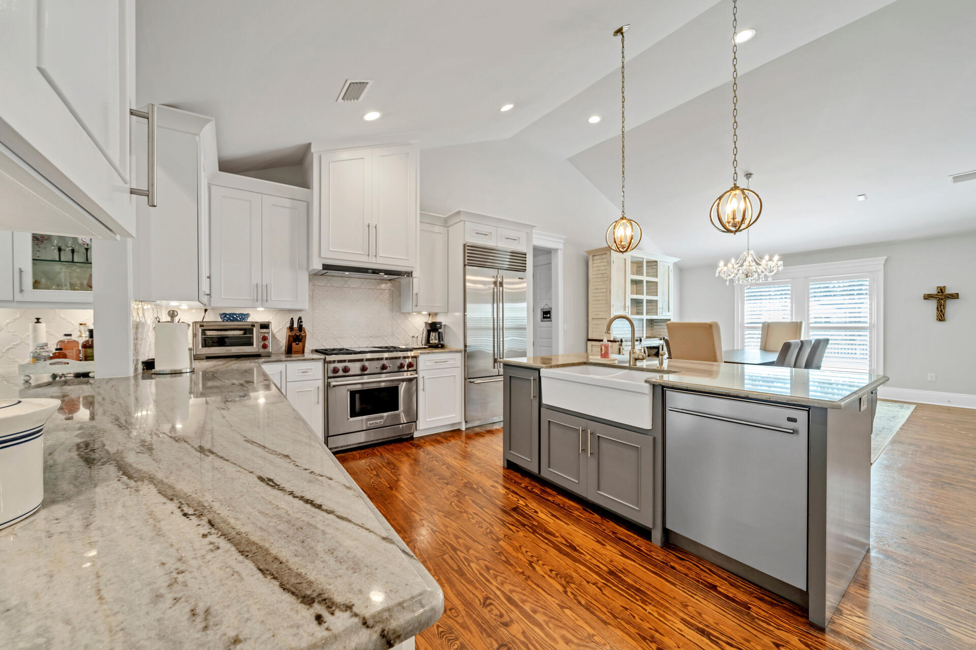 90 Delbert Lane Santa Rosa Beach, FL 32459 - Photo 9 of 47 a kitchen with stainless steel appliances granite countertop a stove top oven a sink a counter space and cabinets