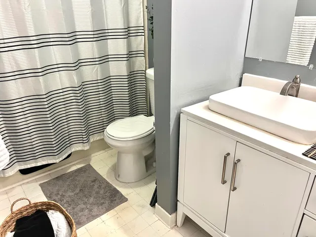 a bathroom with a sink and a toilet