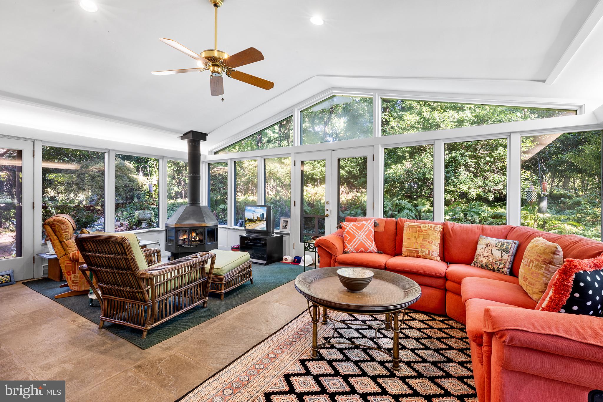 328 Beaumont Road Devon, PA 19333 - Photo 9 of 57 sunroom with gas heated stove