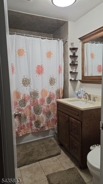 37 Espy Road, Unit 6B Caldwell, NJ 07006 - Photo 2 of 5 a bathroom with a sink and a mirror