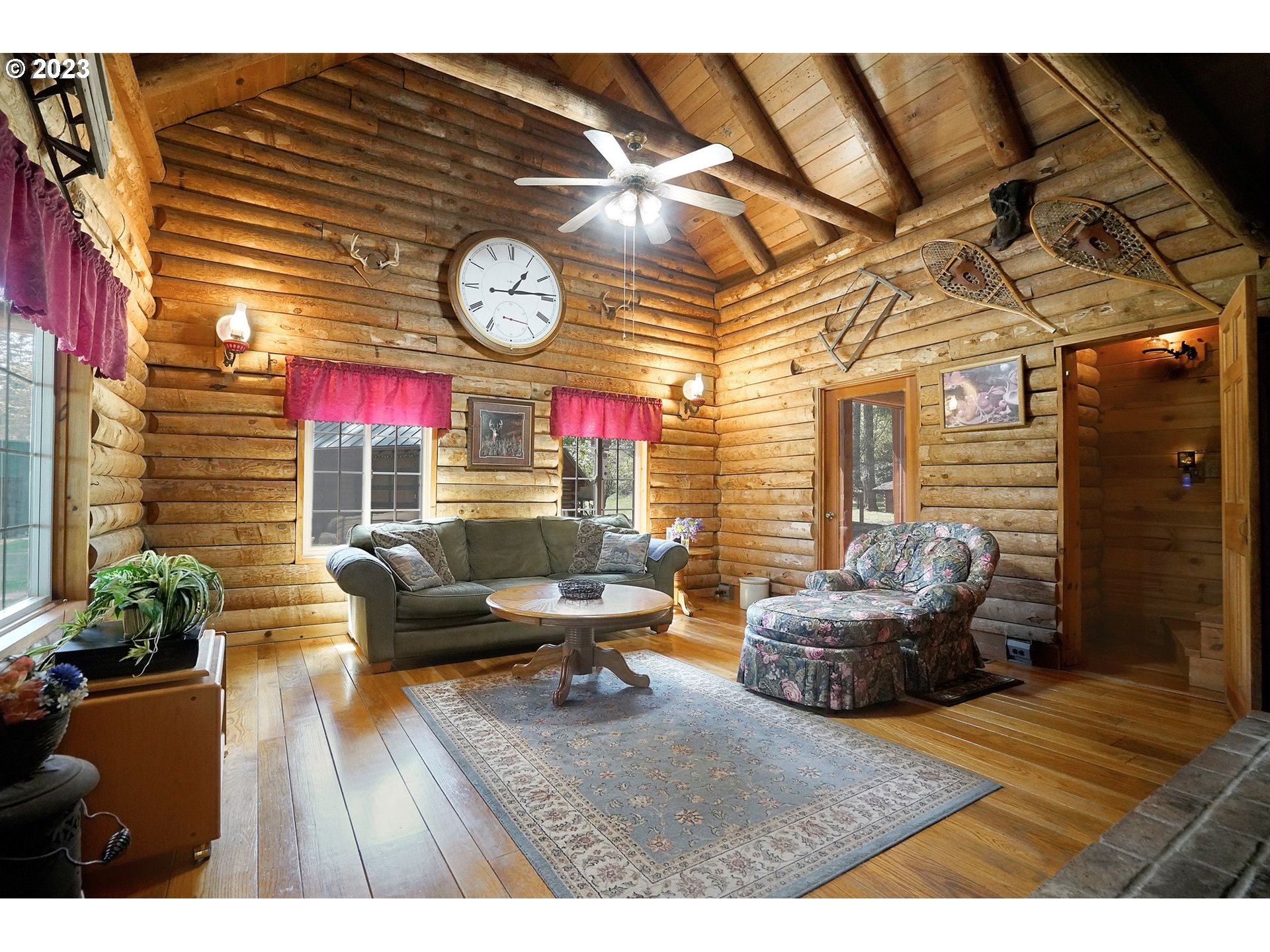 5625 Cooper Hollow Road Dallas, OR 97338 - Photo 4 of 48 a living room with fireplace furniture and a wooden floor
