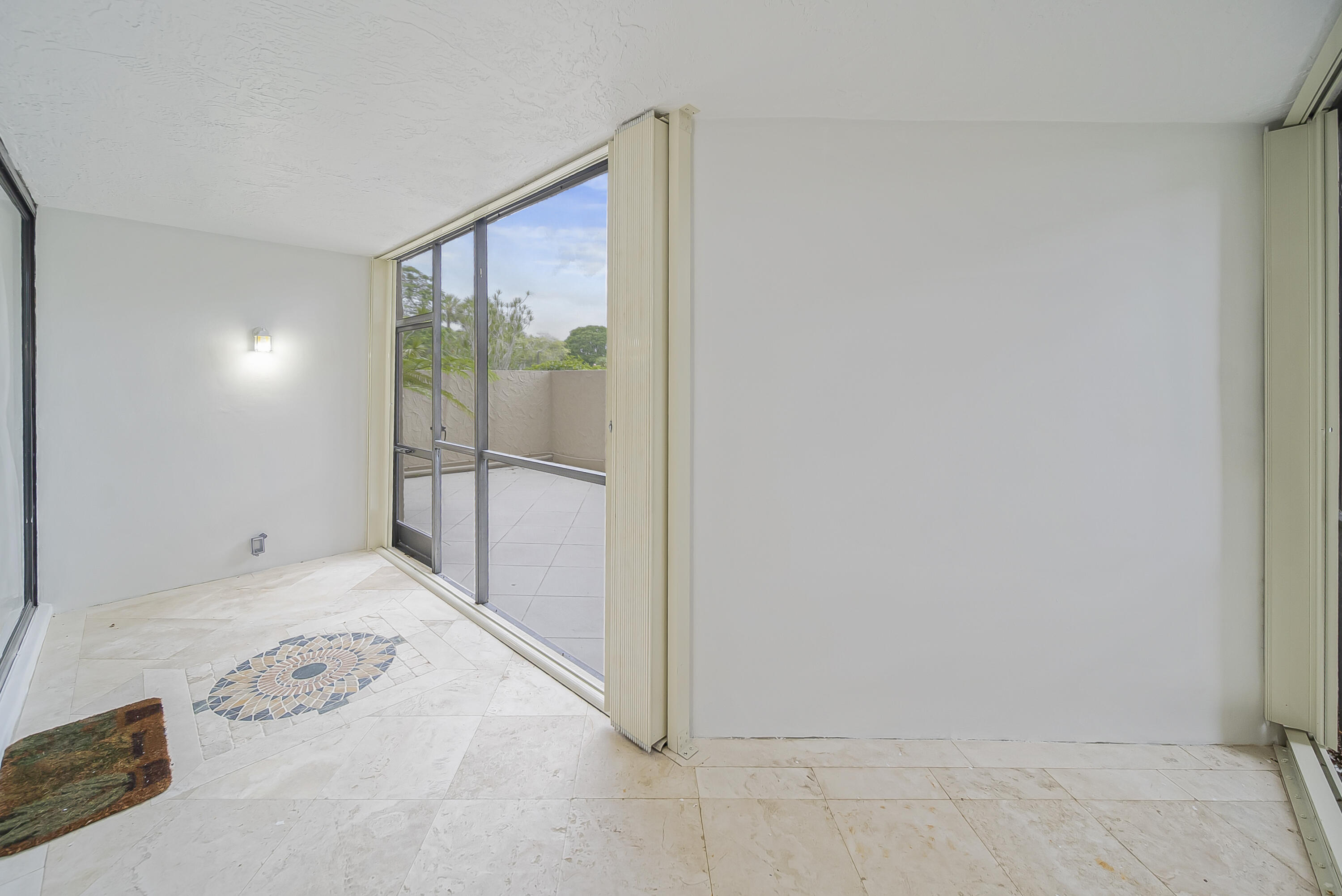 16300 Golf Club Road, Unit 114 Weston, FL 33326 - Photo 19 of 25 Screened-in Patio