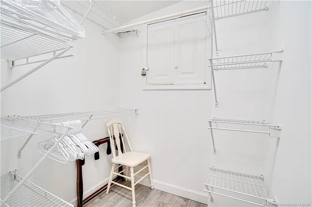 a view of a closet in kitchen