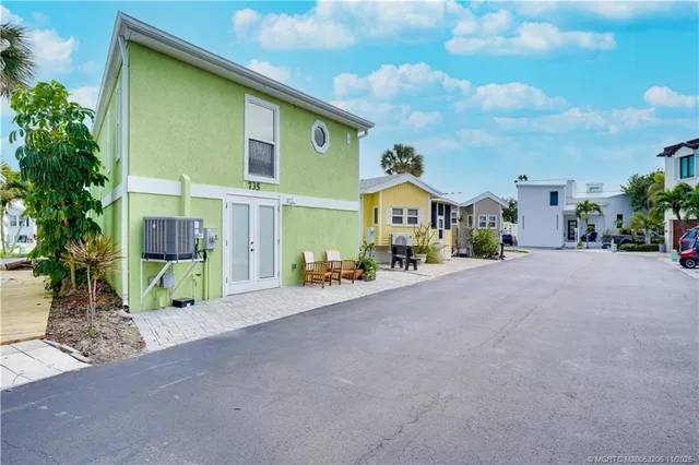 a view of a house with a street