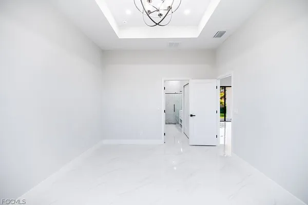 a view of a room with white walls