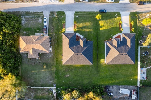 3313 36th Street Southwest Lehigh Acres, FL 33976 - Photo 24 of 27 an aerial view of a house