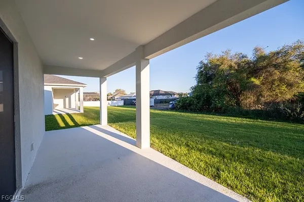 a view of swimming pool with a yard