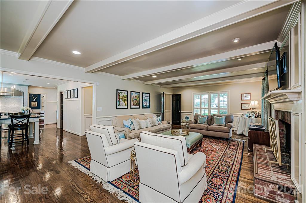 2831 Wickersham Road Charlotte, NC 28211 - Photo 27 of 47 a living room with fireplace furniture and a rug