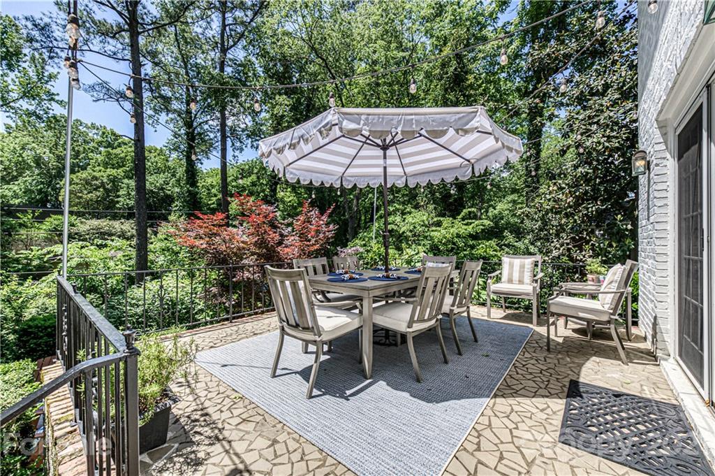 2831 Wickersham Road Charlotte, NC 28211 - Photo 39 of 47 a view of a patio with furniture
