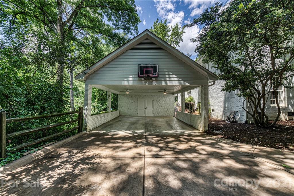 2831 Wickersham Road Charlotte, NC 28211 - Photo 45 of 47 a view of a small house in middle of forest