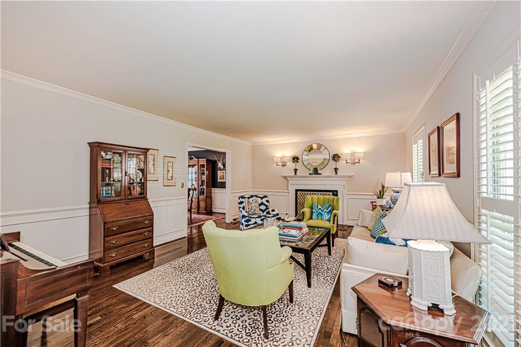 2831 Wickersham Road Charlotte, NC 28211 - Photo 6 of 47 a living room with furniture a table and decor