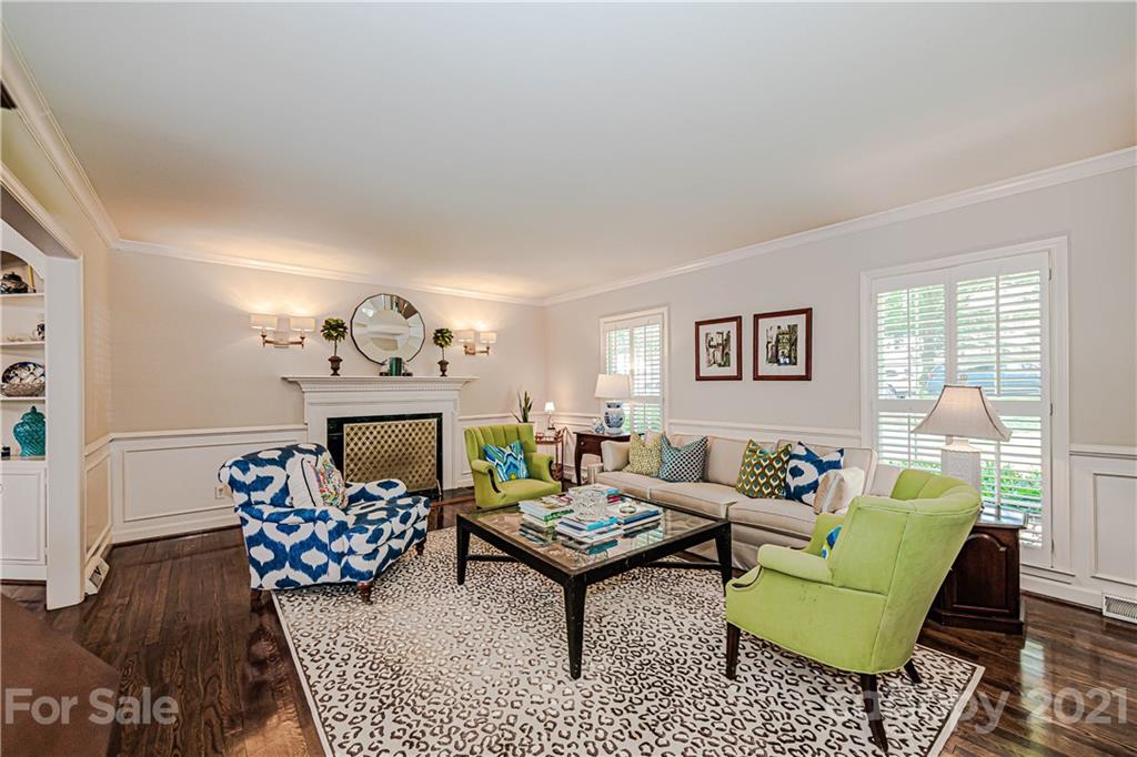 2831 Wickersham Road Charlotte, NC 28211 - Photo 7 of 47 a living room with furniture and a fireplace