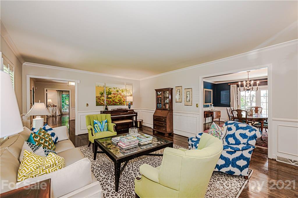2831 Wickersham Road Charlotte, NC 28211 - Photo 9 of 47 a living room with furniture and a table