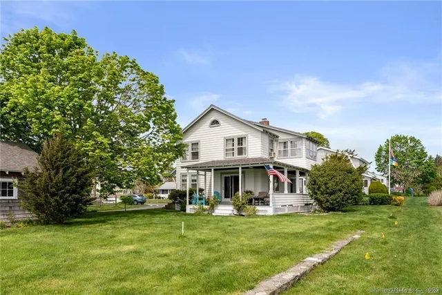 an aerial view of a house with outdoor space