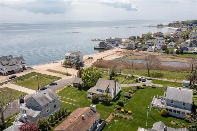 an aerial view of a house with a garden