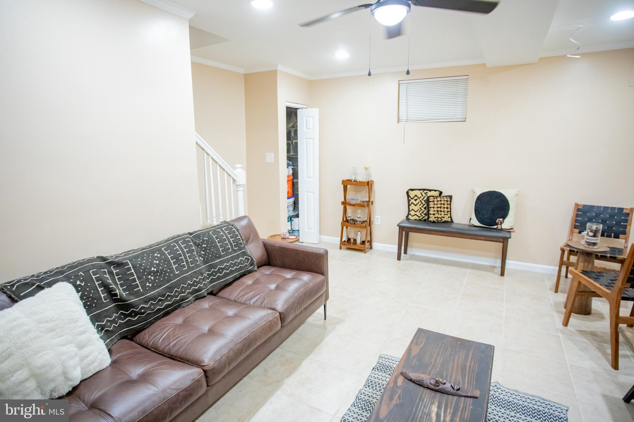 3913 Q Street Southeast Washington, DC 20020 - Photo 12 of 31 a living room with furniture and a couch