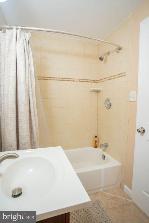 3913 Q Street Southeast Washington, DC 20020 - Photo 18 of 31 a bathroom with a tub and a shower