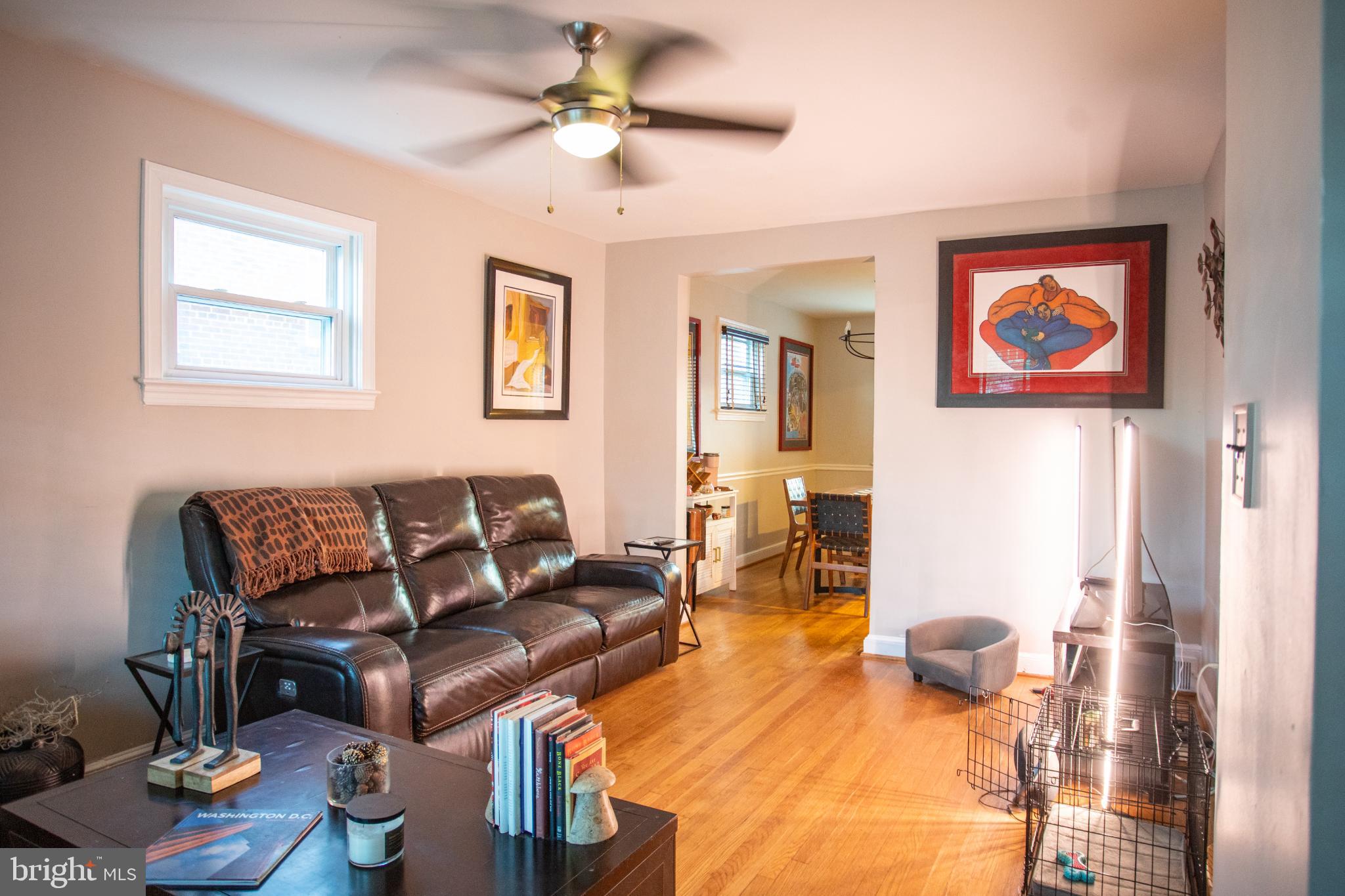 3913 Q Street Southeast Washington, DC 20020 - Photo 2 of 31 a living room with furniture and a wooden floor